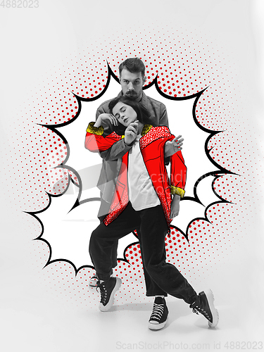 Image of Casual young stylish couple on white background with colourful art drawings in comics style