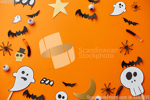 Image of halloween party paper decorations and sweets