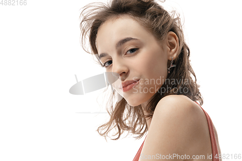 Image of Portrait of beautiful young woman isolated on white studio background. Concept of beauty, skin care, fashion and style