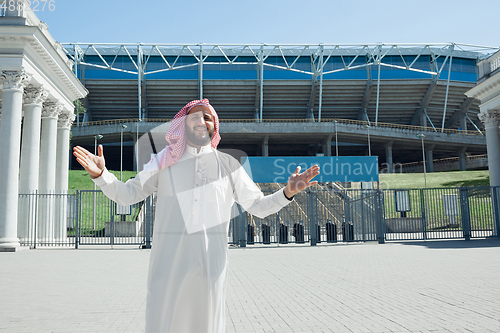 Image of Smiling rich arabian man\'s buying real estate in the city