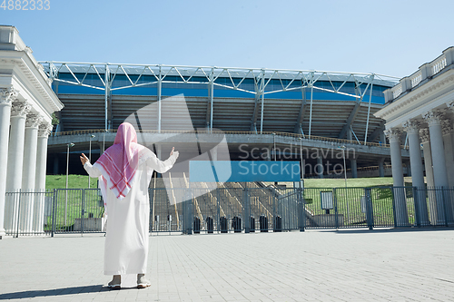 Image of Smiling rich arabian man\'s buying real estate in the city