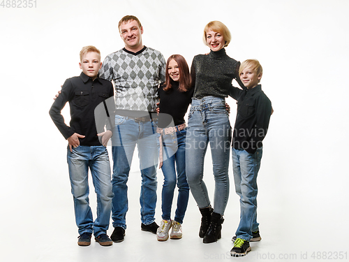 Image of Happy adult large family in casual clothes, full length portrait, isolated on white background