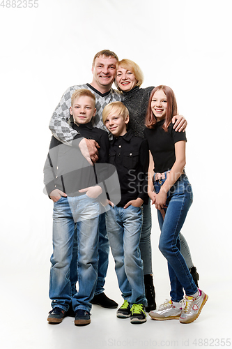 Image of Happy adult large family in full growth isolated on white background