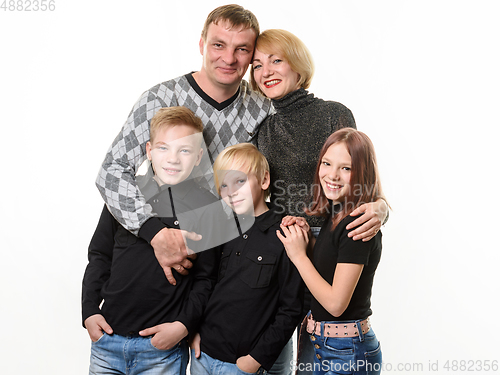 Image of Happy growing up large family, two teenager boys and a girl, isolated on white background