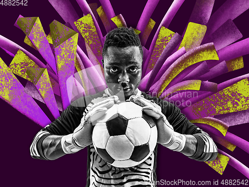 Image of Young male football player, goalkeeper with colourful art drawings in comics style