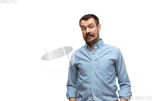 Image of Young caucasian man with funny, unusual popular emotions and gestures isolated on white studio background