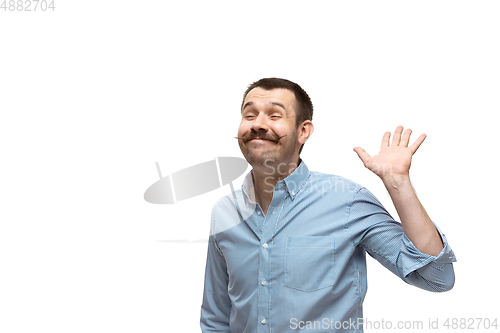 Image of Young caucasian man with funny, unusual popular emotions and gestures isolated on white studio background