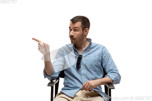 Image of Young caucasian man with funny, unusual popular emotions and gestures isolated on white studio background