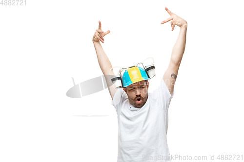 Image of Young caucasian man with funny, unusual popular emotions and gestures isolated on white studio background