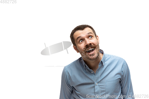 Image of Young caucasian man with funny, unusual popular emotions and gestures isolated on white studio background