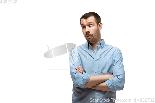 Image of Young caucasian man with funny, unusual popular emotions and gestures isolated on white studio background