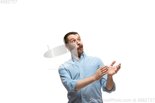 Image of Young caucasian man with funny, unusual popular emotions and gestures isolated on white studio background