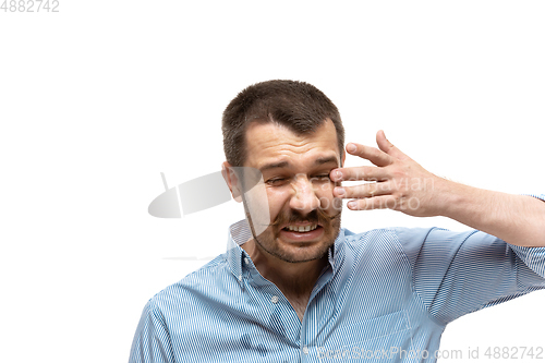 Image of Young caucasian man with funny, unusual popular emotions and gestures isolated on white studio background