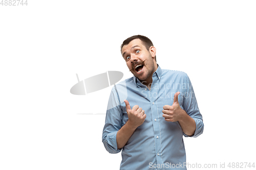 Image of Young caucasian man with funny, unusual popular emotions and gestures isolated on white studio background