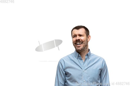 Image of Young caucasian man with funny, unusual popular emotions and gestures isolated on white studio background