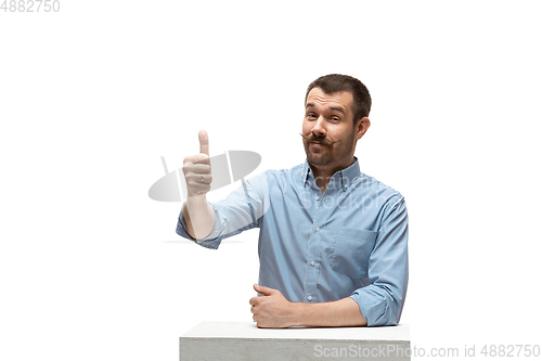 Image of Young caucasian man with funny, unusual popular emotions and gestures isolated on white studio background