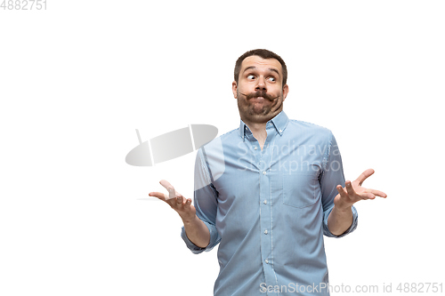 Image of Young caucasian man with funny, unusual popular emotions and gestures isolated on white studio background