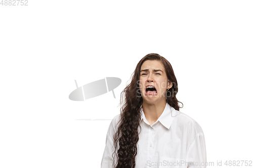 Image of Young caucasian woman with funny, unusual popular emotions and gestures isolated on white studio background