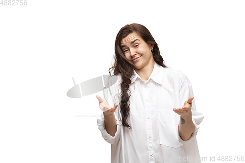 Image of Young caucasian woman with funny, unusual popular emotions and gestures isolated on white studio background