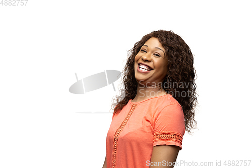 Image of Young african-american woman with funny, unusual popular emotions and gestures isolated on white studio background