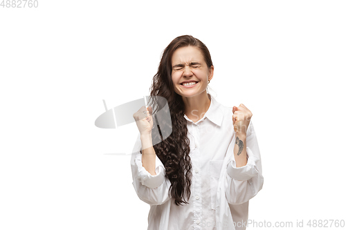 Image of Young caucasian woman with funny, unusual popular emotions and gestures isolated on white studio background