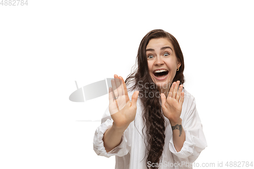 Image of Young caucasian woman with funny, unusual popular emotions and gestures isolated on white studio background