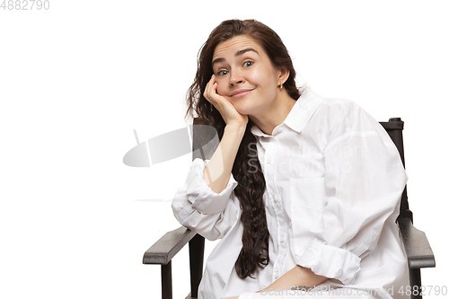 Image of Young caucasian woman with funny, unusual popular emotions and gestures isolated on white studio background