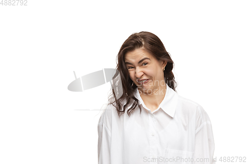 Image of Young caucasian woman with funny, unusual popular emotions and gestures isolated on white studio background