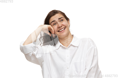 Image of Young caucasian woman with funny, unusual popular emotions and gestures isolated on white studio background
