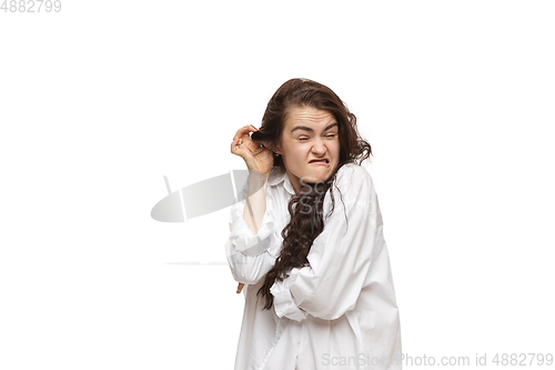 Image of Young caucasian woman with funny, unusual popular emotions and gestures isolated on white studio background