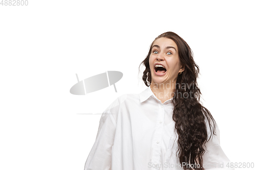 Image of Young caucasian woman with funny, unusual popular emotions and gestures isolated on white studio background