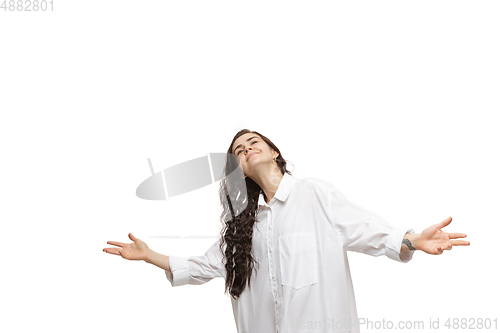 Image of Young caucasian woman with funny, unusual popular emotions and gestures isolated on white studio background