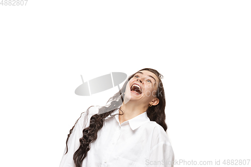 Image of Young caucasian woman with funny, unusual popular emotions and gestures isolated on white studio background