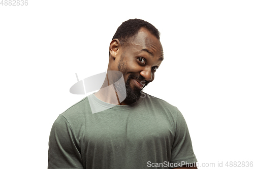 Image of Young african-american man with funny, unusual popular emotions and gestures isolated on white studio background