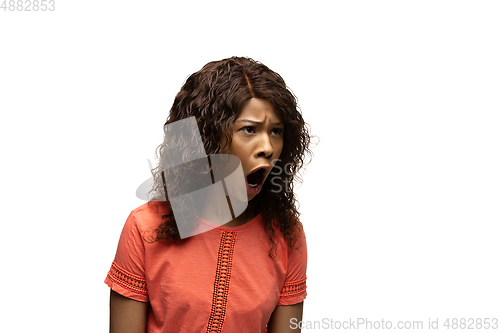 Image of Young african-american woman with funny, unusual popular emotions and gestures isolated on white studio background