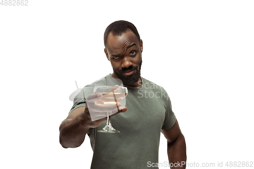 Image of Young african-american man with funny, unusual popular emotions and gestures isolated on white studio background