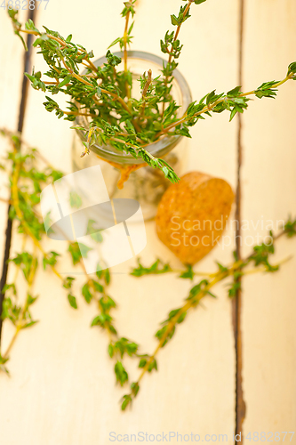 Image of fresh thyme on a glass jar