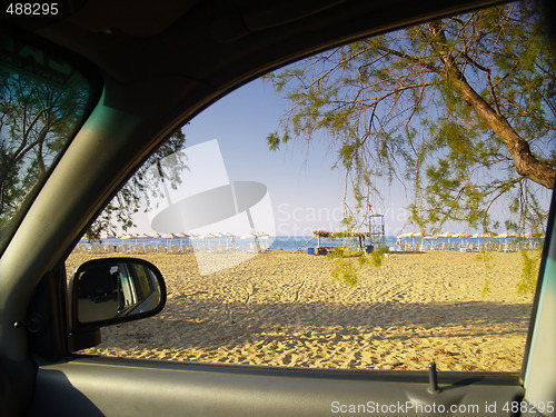 Image of evening on the beach, driving by