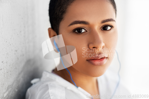 Image of african american woman with earphones