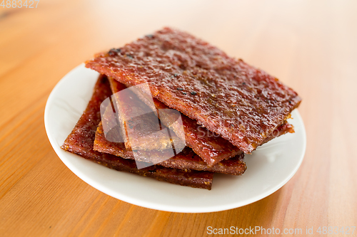 Image of Sliced dried pork on dish