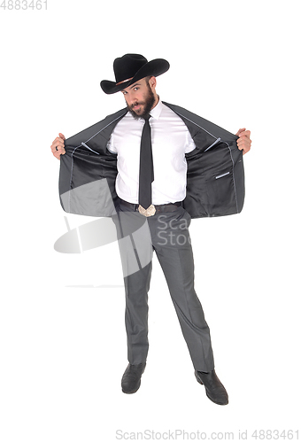 Image of A portrait image of a man in a suit open his jacket
