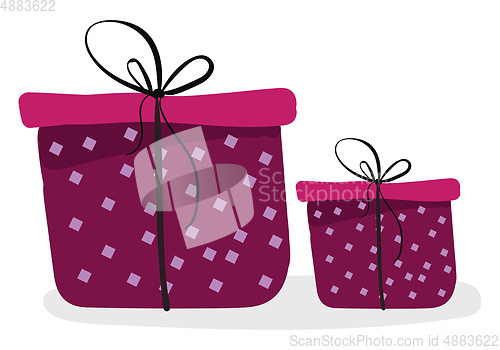 Image of Two beautiful pink present boxes tied with a black ribbon and to