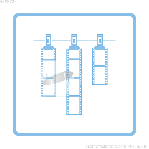 Image of Icon of photo film drying on rope with clothespin