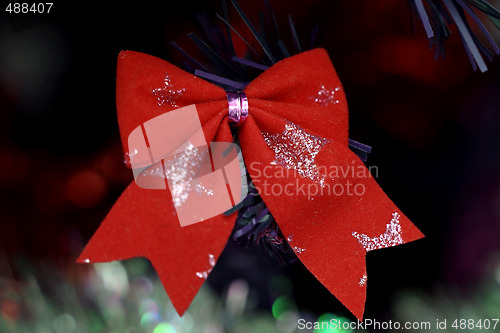 Image of Christmas ornaments on tree.