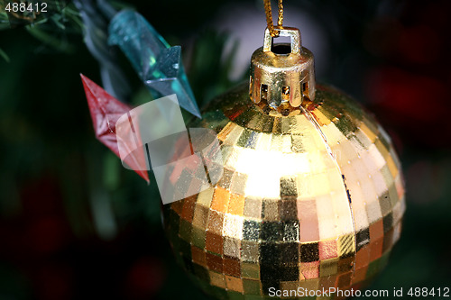 Image of Christmas ornaments on tree.