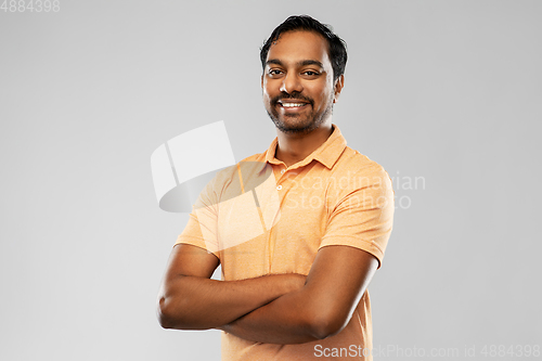 Image of portrait of happy smiling young indian man