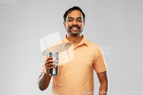 Image of indian man with thermo cup or tumbler for drink