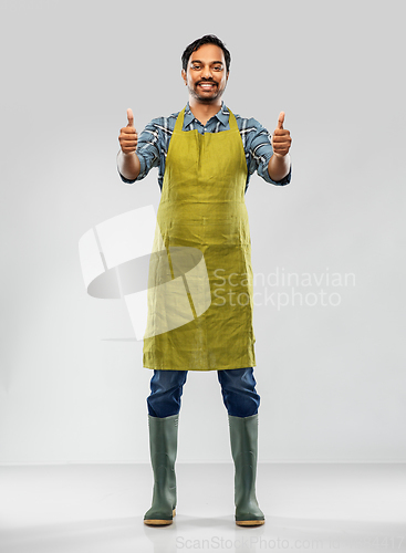 Image of indian male gardener or farmer showing thumbs up