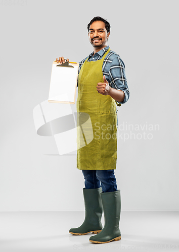 Image of indian male gardener or farmer showing thumbs up