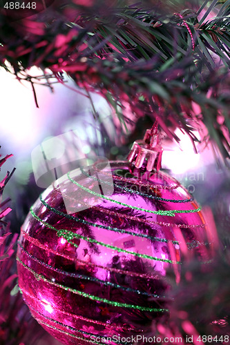 Image of Christmas ornaments on tree.